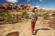 © Maygutyak - Hiker in Canyonlands National park, needles in the sky, in Utah, USA