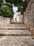 Fototapeta Na drzwi - Old street in Sucuraj, Hvar island, Croatia with stairs