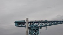 Panning To The Right Along The Top Of The Titan Crane, A 150 Foot High Cantilever Structure, On The Clyde Riverside At Clydebank. 