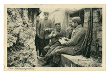 German Historical Photo Postcard:  Soldiers In The Trench Smoking Pipes, Playing Cards. One Holds A Frying Pan With Food. In Between Attacks. World War One 1914-1918. Germany