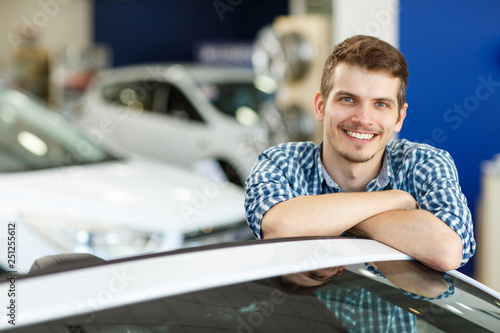 photo Standing Pose For Boys With Car adobe stock