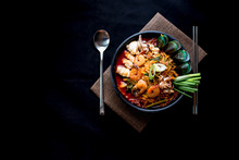 Korean food, Jampong, spicy noodle seafood in black bowl for korean menu style.