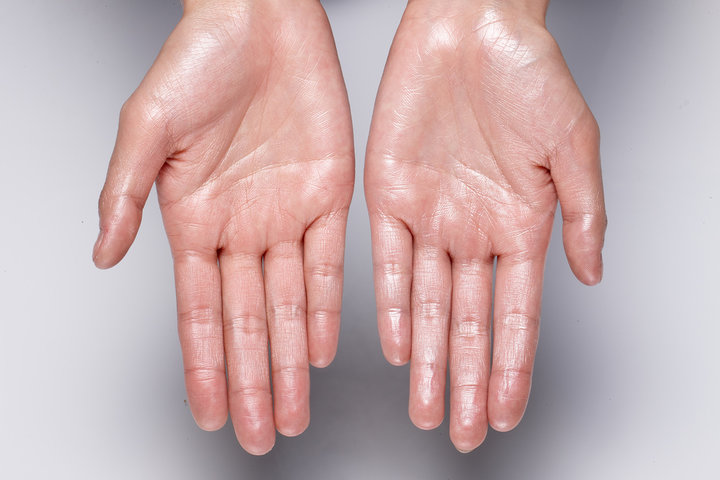 glossy hand. wet hands.