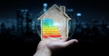 Wall Mural - businessman using 3d rendering energy rating chart in a wooden house