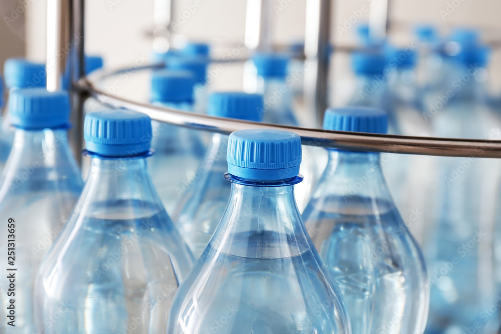 Many bottles of clean water in shop