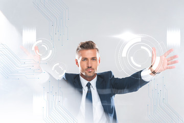 Wall Mural - handsome businessman holding innovation technology isolated on white, artificial intelligence concept