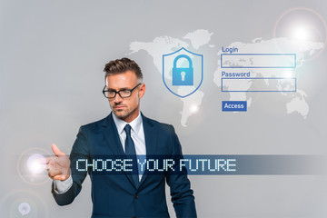 Wall Mural - handsome businessman in glasses pointing on something isolated on grey, artificial intelligence concept