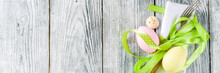Easter Table Setting With Eggs, Ribbon And Cutlery,wooden Background Copy Space Top View Banner