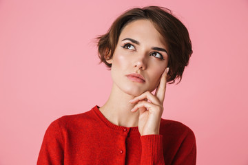 Canvas Print - Portrait of a beautiful young woman wearing red clothes