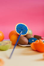 Different Kinds Of Fruit Photographed On Colorful Background And Painted With Different Colours.