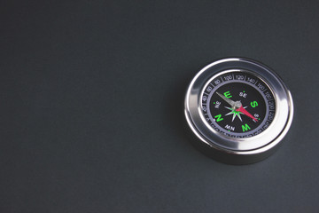 compass on the table .
