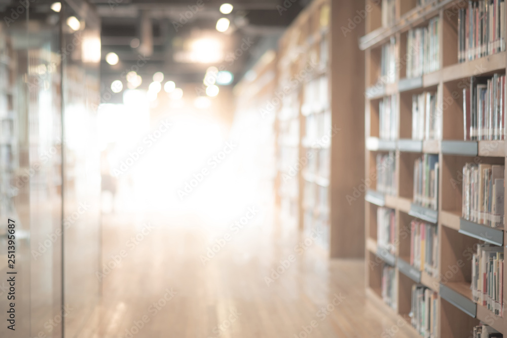 Abstract blurred public library interior space. blurry room with bookshelves by defocused effect. use for background or backdrop in business or education concepts - obrazy, fototapety, plakaty 