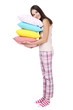 © 5second - Young girl holding colorful pillows on white background