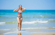 © Max Topchii - Girl having fun on the tropical beach