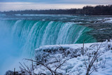 Fototapeta Łazienka - Niagara Falls CANADA - February 23, 2019: Winter frozen idyll at Horseshoe Falls, the Canadian side of Niagara Falls, view showing as well as the upper Niagara River