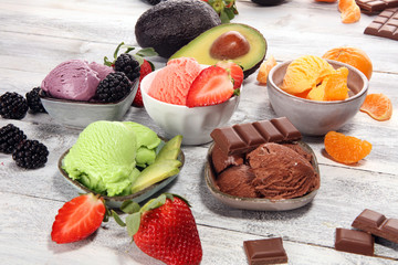 Poster - Set of ice cream scoops of different colors and flavours with berries, chocolate and fruits.