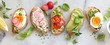 Breakfast sandwich bread with avocado, egg, radishes and tomatoes. Bruschetta or healthy snack ideas