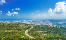 Panoramic View Of The Bay Of Haifa, With Downtown Haifa, The Harbor, The Industrial Zone In A Sunny Summer Day. Viewed From Haifa University. Haifa, Northern Israel