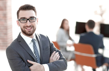 modern businessman standing in office.