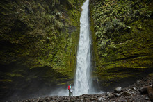 Rear View Of Mother And Son Standing Near Las Cascadas Waterfall