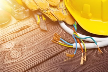 Wall Mural - Yellow hard hat and leather work gloves