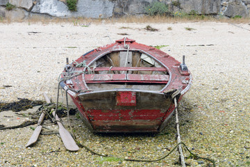 wooden fishing boat dries ashore