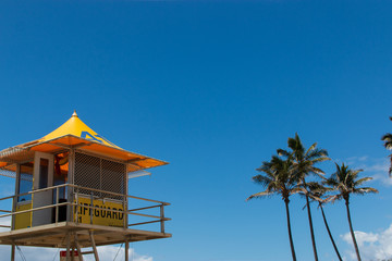 Wall Mural - lifeguard tower on the beach sunny summer day