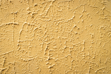 Old yellow texture stone wall abstract background.