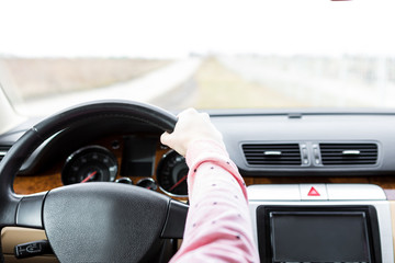 Wall Mural - driving the modern car on asphalt road