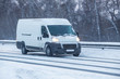 Minivan moves on winter road