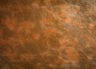Wall Mural - Texture of brown leather background. Surface of material made from animal skin.