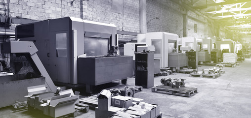 CNC machines at the plant for the production of valves. Factory workspace