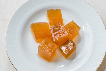 Wall Mural - Turkish Crispy Pumpkin Dessert from Hatay / Kirecte Kabak Tatlisi with Walnut Powder.