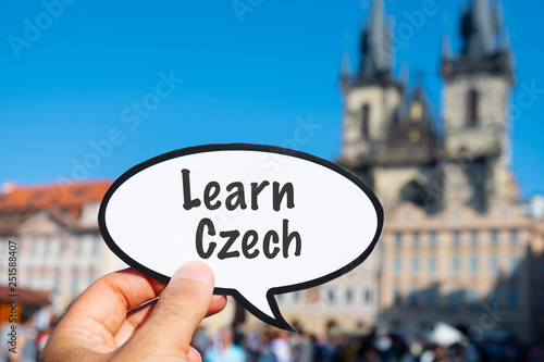 Foto signboard with the text learn Czech in Prague
