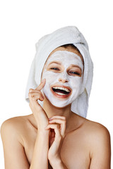 Wall Mural - beautiful young woman applying facial mask on her face. skin care and treatment, spa, natural beauty