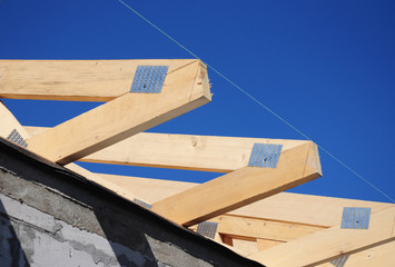 Wall Mural - Roofing construction house with wooden beams, trusses, frame, timber and measurement tape