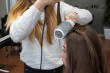  A Hairdresser Master Doing Blow-drying In A Beauty Salon