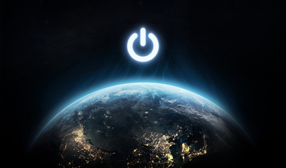 Planet Earth and power button. Earth hour event. Ecology. Elements of this image furnished by NASA