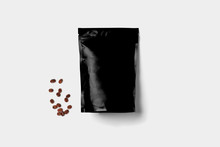 Black Blank Paper Bag Mock Up For Tea, Coffee And Grain Packaging. Isolated On A Soft Gray Background.High Resolution Photo.Coffee Beans.