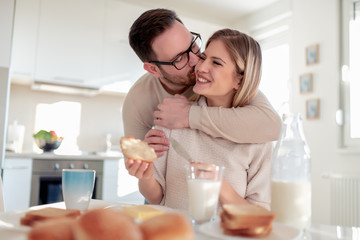 Canvas Print - Young couple having breakfast