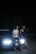 © pha88 - Couple in love near the car at night