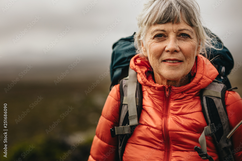 Close up of a female during trekking - obrazy, fototapety, plakaty 