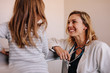 © Jacob Lund - Pediatrician with girl patient at clinic