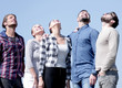 © ASDF - closeup.a team of young people looks up