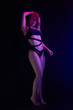 © MineevPh - Pole dance girl with perfect body in black sexy lingerie. Night club concept
