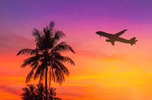 Sunset On Tropical Beach With Coconut Palm Trees During Silhouette Airplane Flying Take Off Over