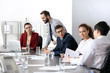 © Pixel-Shot - Young people having business meeting in office