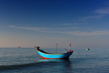 Traditional fishing boat and sea, tourist attraction