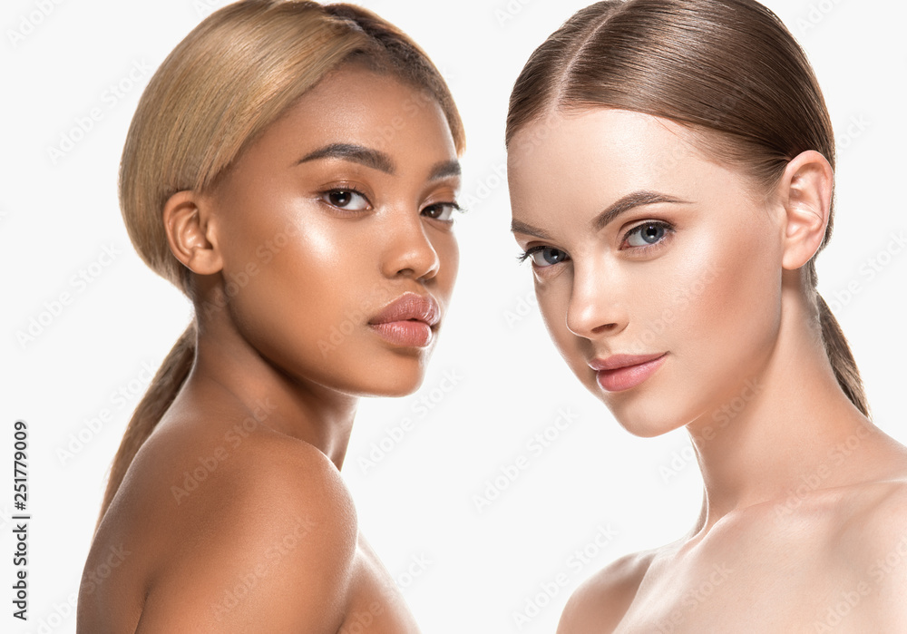 Two wemen with dark and light skin tone caucasian and african american models with different skintones lines beauty healthy concept - obrazy, fototapety, plakaty 