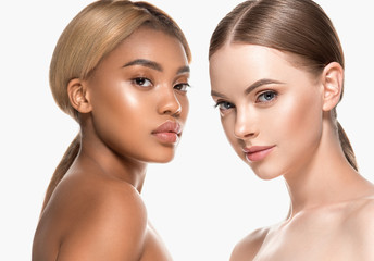 Two wemen with dark and light skin tone caucasian and african american models with different skintones lines beauty healthy concept